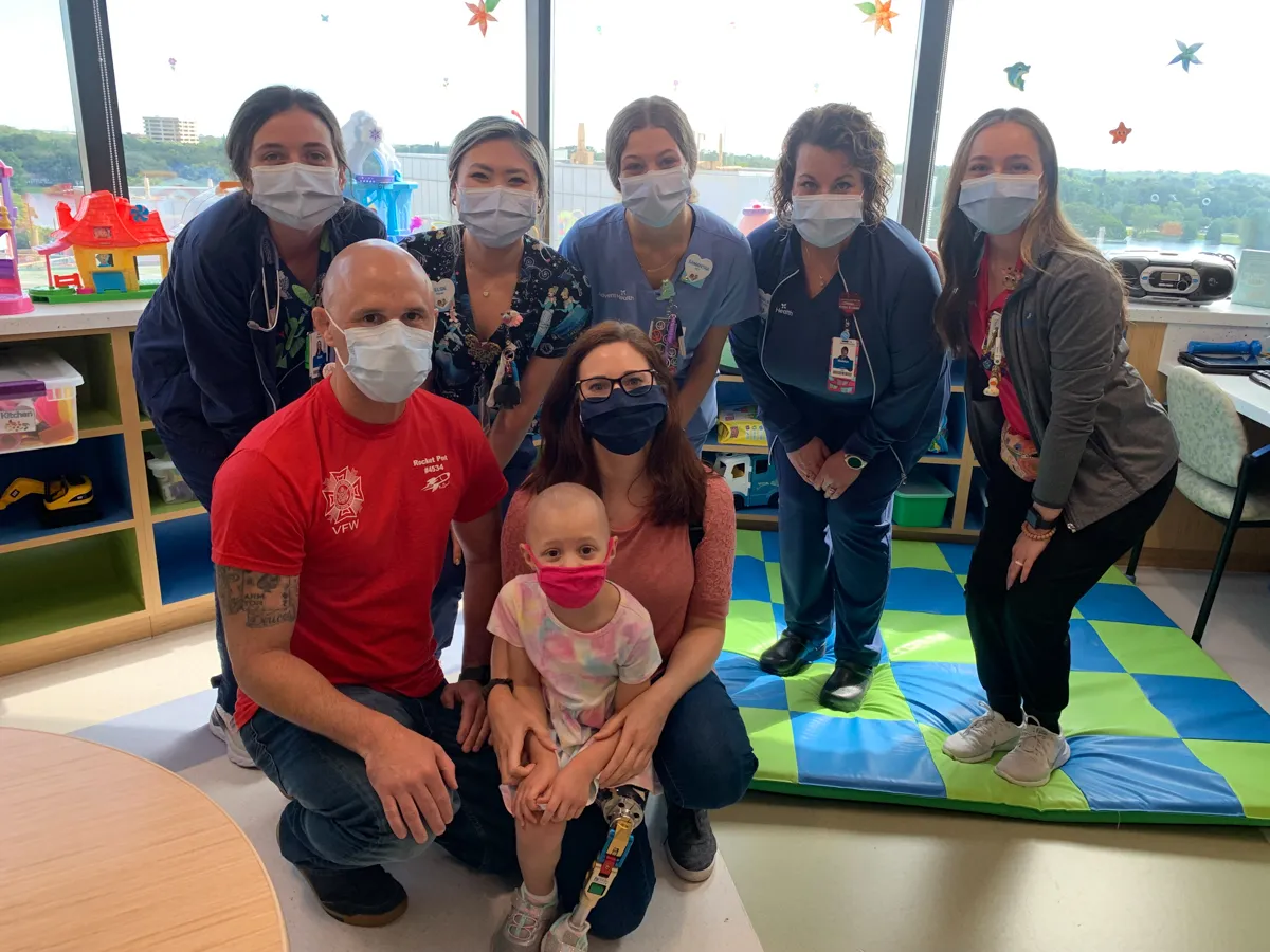 daniel webb with his daughter and staff at adventhealth for children