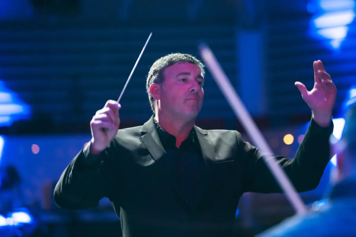 Director saw orchestra as the perfect way to bring team members together during a dark time.