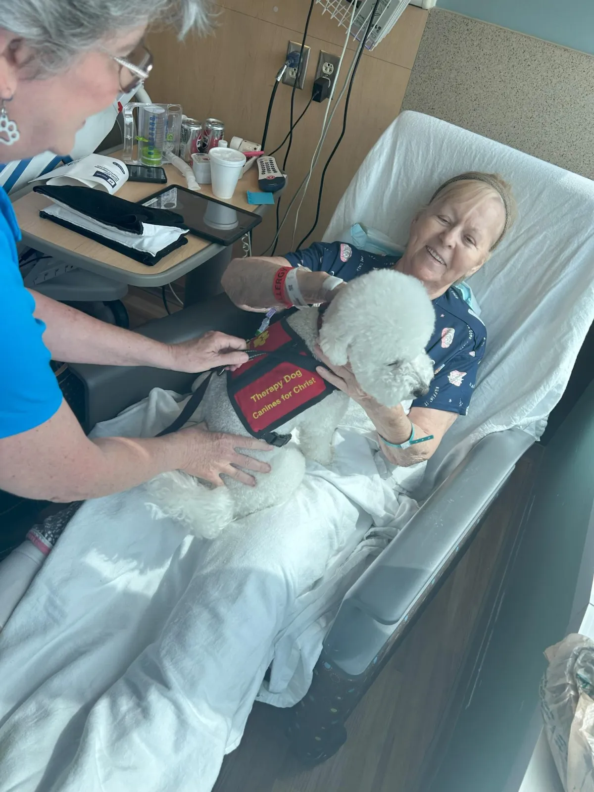Brimley, guided by handler Janet Beasley, came to brighten up Lake County resident Eleanor Perry’s day with some pet therapy.
