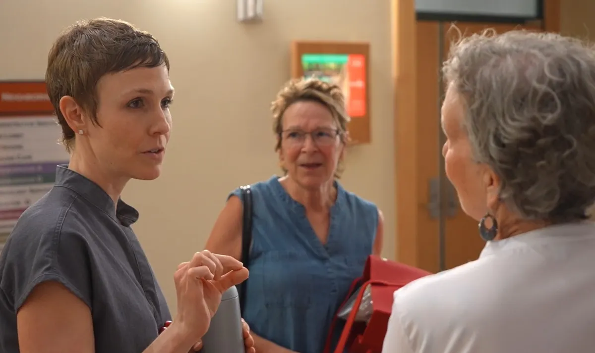 Dr. Amber Orman discusses the HEAL program with some of her patients.