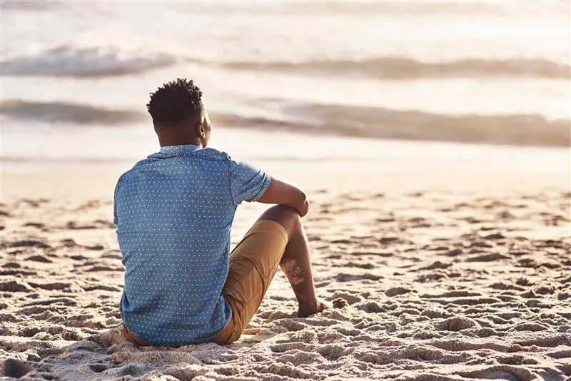 Man sitting on beach