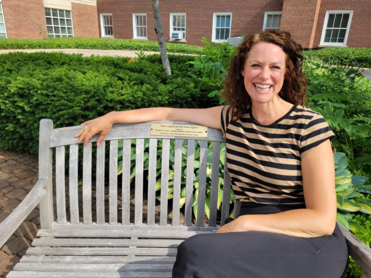 Shona Moeller on the bench donated in her family's honor