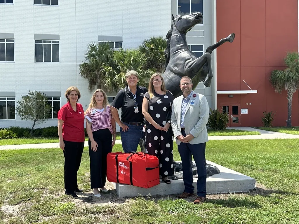 Leaders from Davenport High School accepted the donated kit from the American Heart Association and AdventHealth Heart of Florida during a special event at the school