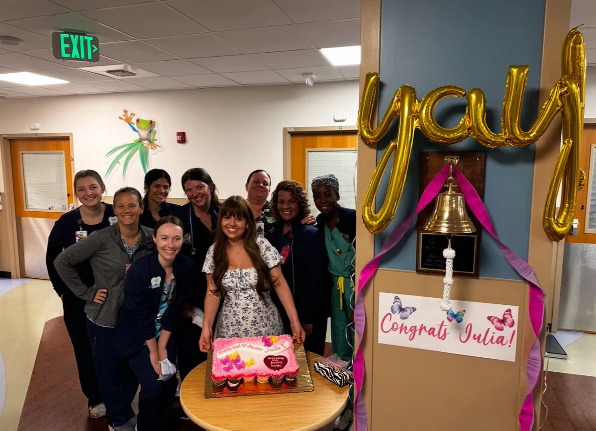 Julia and her oncology team on her last day of chemotherapy.