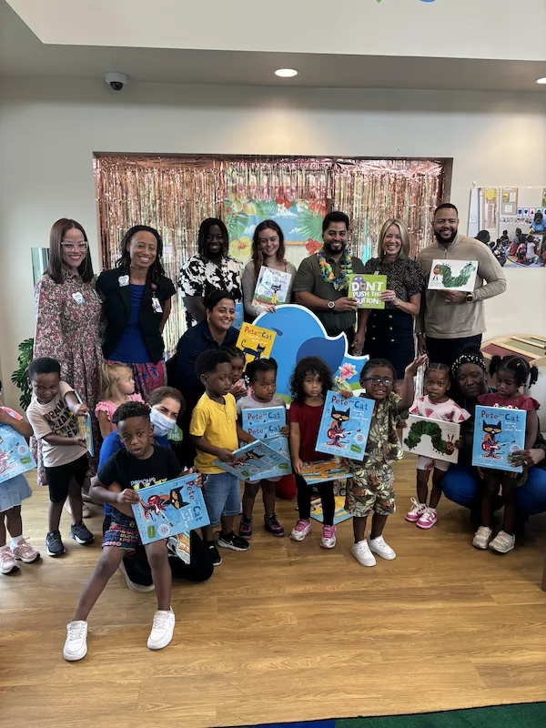 Dr Moby donates books to ELC