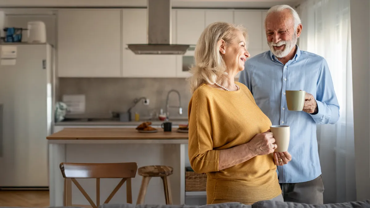 60s couple in their living room