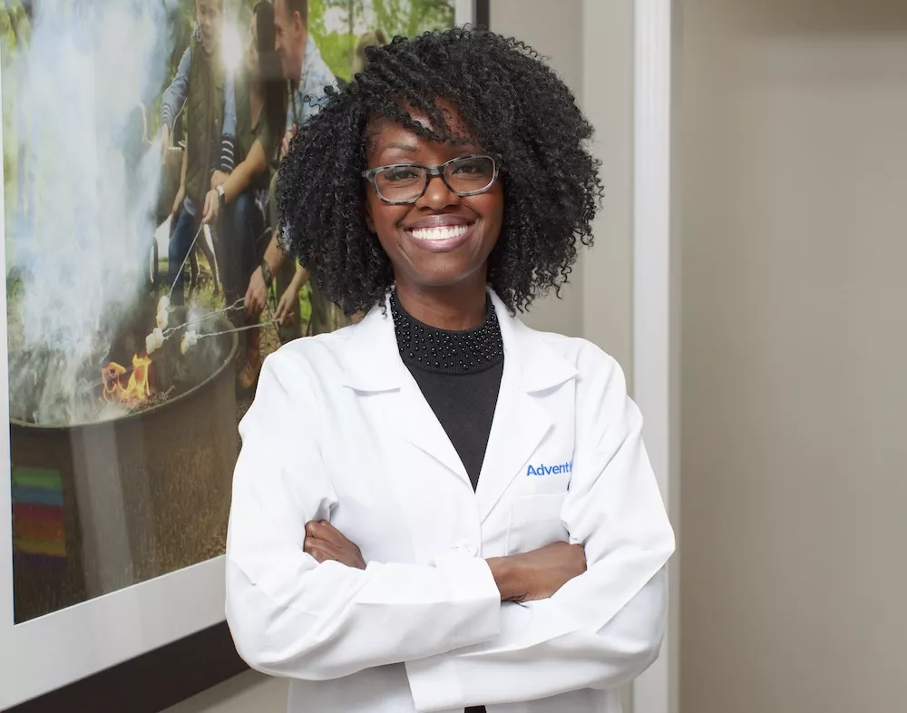 Dr. Rachel Harris, cardiologist stands and smiles