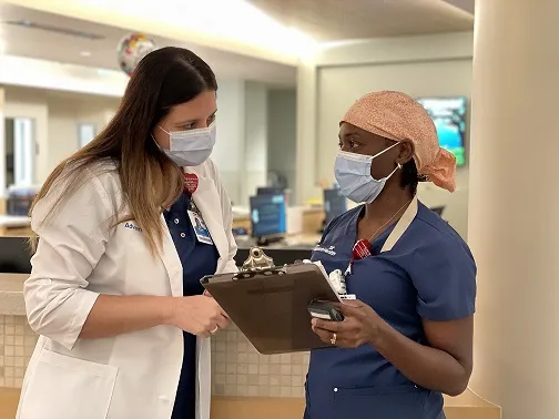 Shezel O’Neal  and AdventHealth Celebration team member