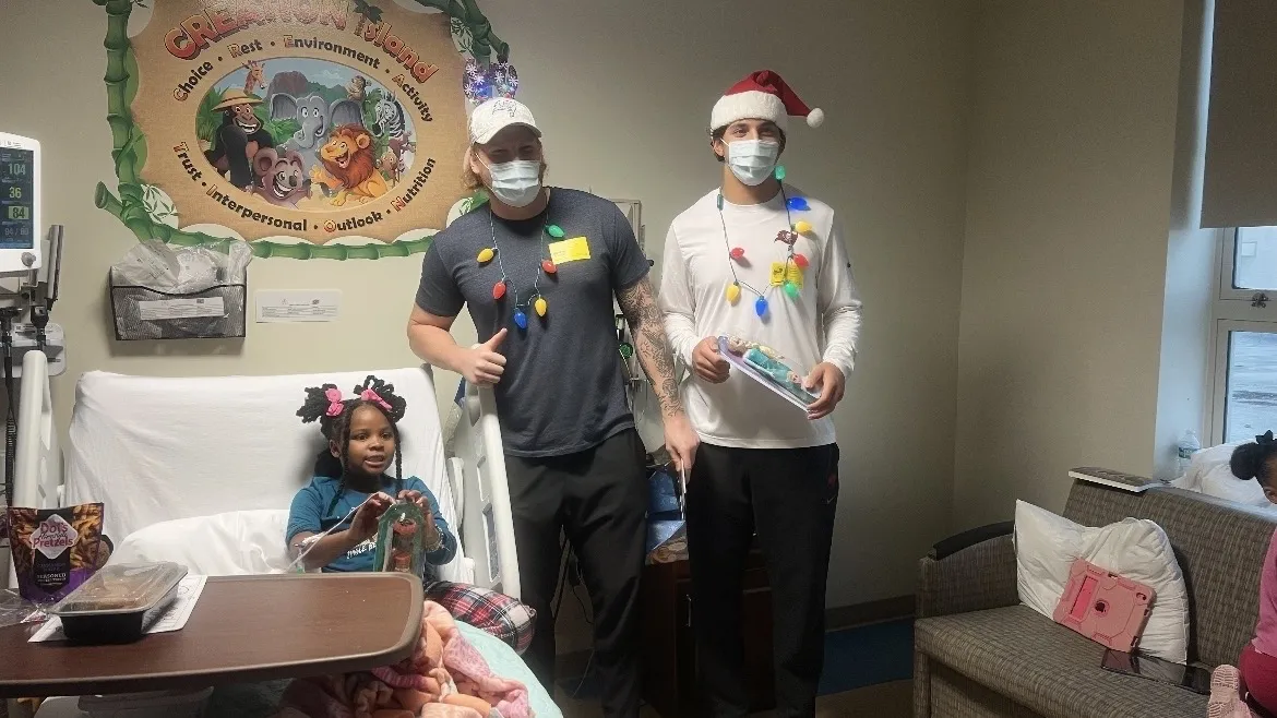 kids receiving care at AdventHealth Tampa got a special surprise -- a visit and a gift from the Tampa Bay Buccaneers!