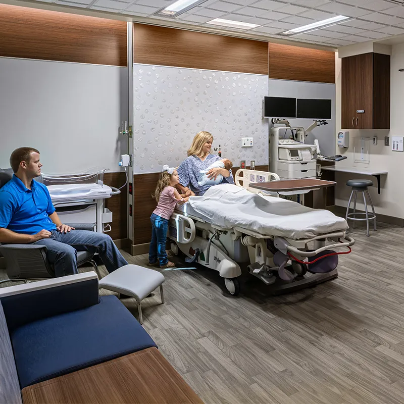 A family and newborn baby in The Baby Place suites at AdventHealth Gordon