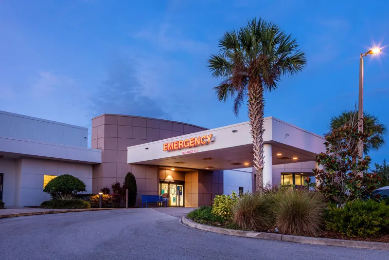 A photo of the AdventHealth Lake Wales facility at dusk.